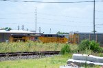 UP 6580 shoves on the rear of a manifest at Tower 26